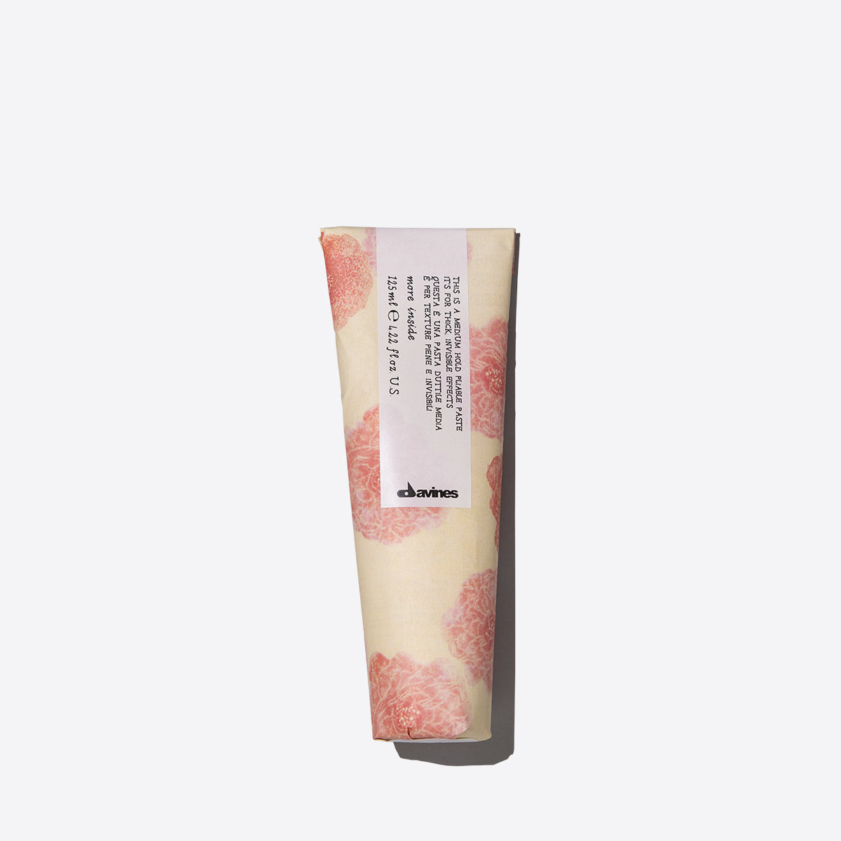 Davines "this is a medium hold pliable paste"