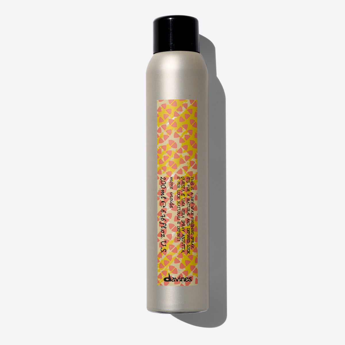 Davines "this is a dry wax finishing spray"
